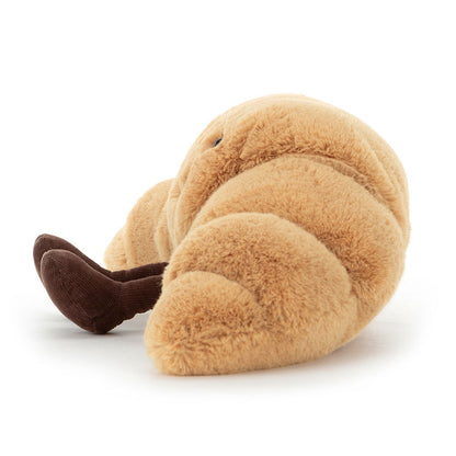 Détail broderie sourire peluche croissant Jellycat