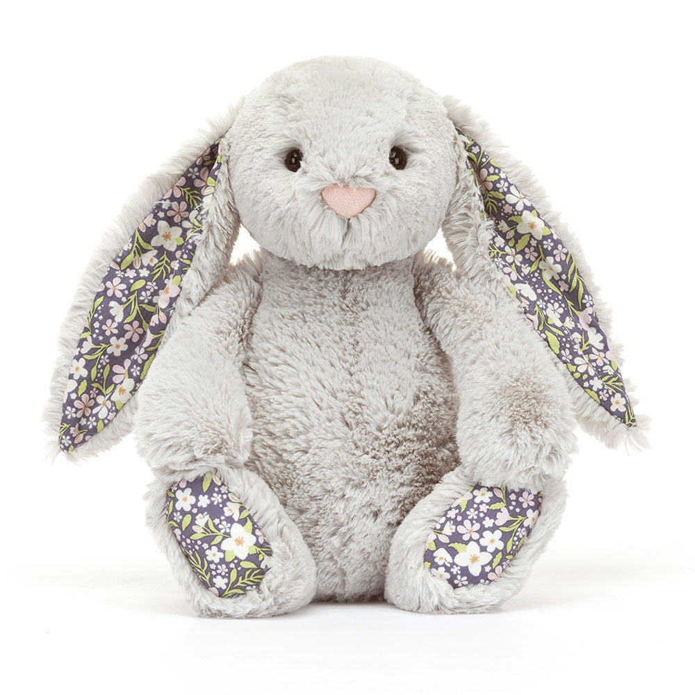 Peluche lapin gris argenté Jellycat Blossom Silver Bunny Bloom avec imprimé floral dans les oreilles.