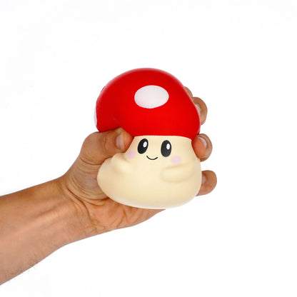 Balle anti-stress en forme de champignon rouge et blanc Legami.