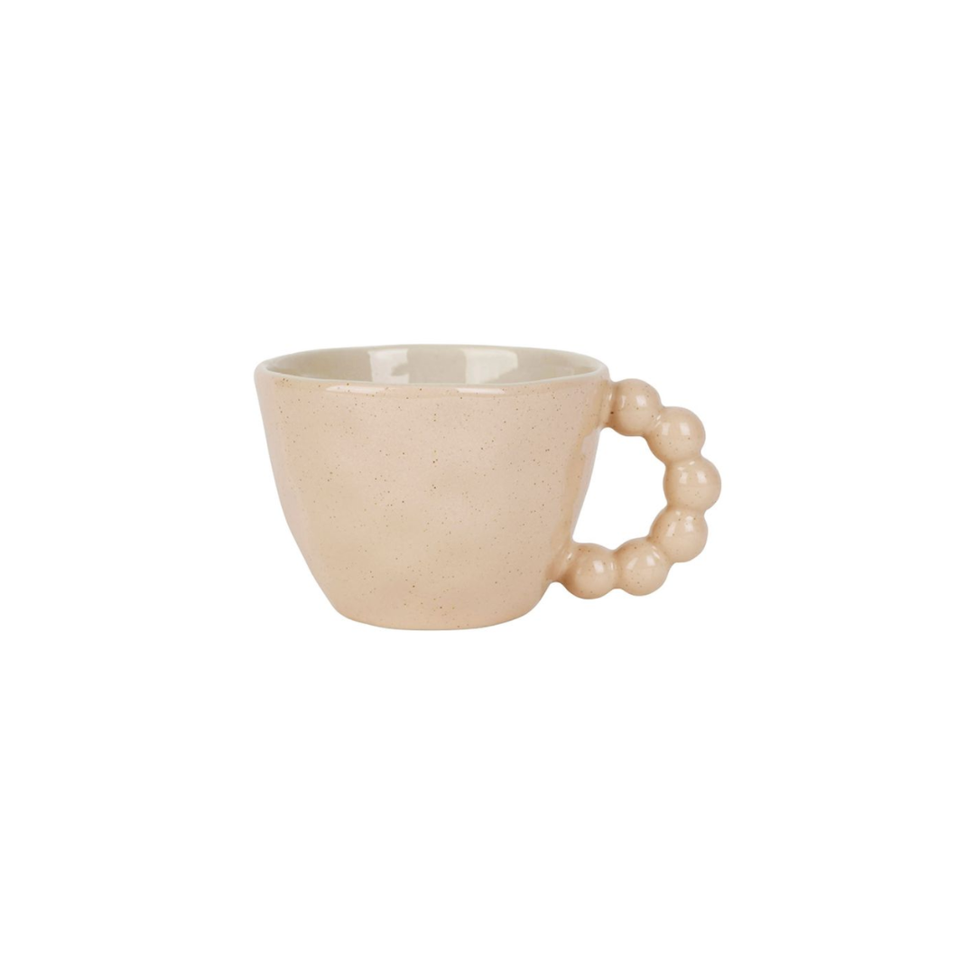 Tasse à thé en grès nude moucheté avec anse design perlée, collection Organic par SEMA Design.