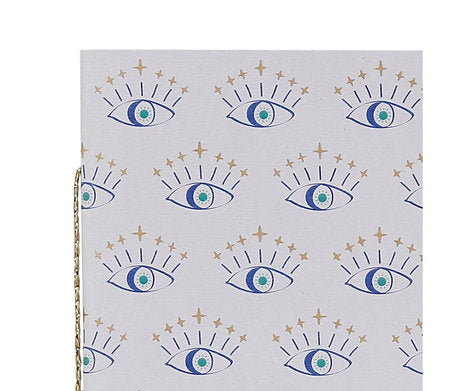 Détail motifs œil protecteur dorés répétés carnet Visionary collection Sema Design