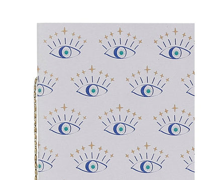 Détail motifs œil protecteur dorés répétés carnet Visionary collection Sema Design