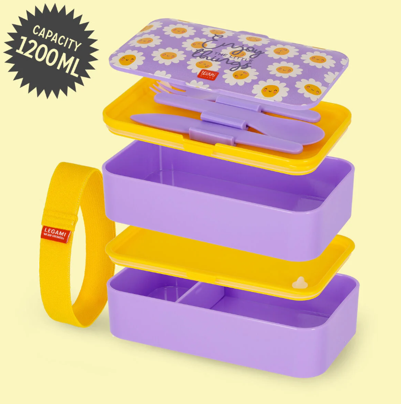 Intérieur de la boîte repas Daisy montrant les compartiments superposés et les 3 couverts.