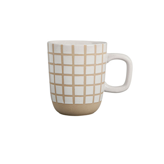 Mug blanc en céramique 40 cl, collection Courba de Sema Design. Finition texturée, forme généreuse, parfait pour les boissons chaudes du quotidien.
