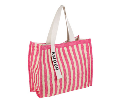 vue de côté Sac cabas Solencia rose en raphia tressé SEMA Design style bohème chic